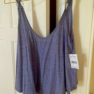 Free people tank never been worn! Very flattering!